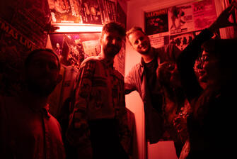 dollmaker with full band backstage at Nomads Athens, 2024.
